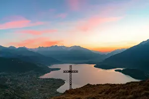 Mountain Peak Prints: Colorful sky at dawn over Lake Como and Alto Lario view from summit cross on Crocetta mountain above Dongo village