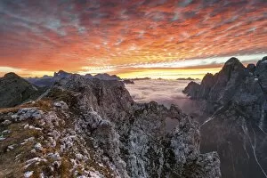 Orange Gallery: Colorful sunrise over the ridges of the Pale of the Balconies, Pala group, Dolomites, Italy