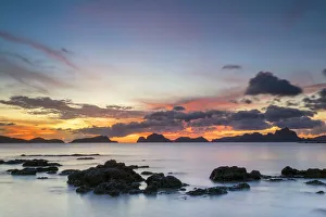 Province Of Palawan Prints: Colorful sunset over Bacuit Bay at Marimegmeg Beach, El Nido, Palawan, Philippines