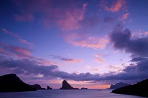 Dark Prints: A colorful sunset seen from the village of Sorvagur (island of Vagar)