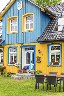 Fischland Prints: Colorfully painted wooden house in Born am Darss