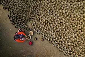 Coloring of clay pots, Bogura, Bangladesh