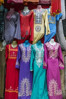 Images Dated 28th March 2017: Colour womens dresses for sale, Khan el-Khalili bazaar (Souk), Cairo, Egypt