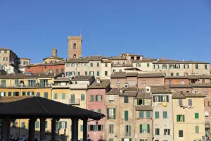 Colourful buildings and covered market in Siena, Tuscany, Italy