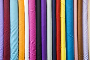 Colourful cotton fabrics for sale in Souk Waqif, Doha, Qatar