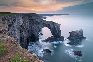 Q2 2024 Prints: Colourful dawn sky above the Green Bridge of Wales natural arch in Pembrokeshire