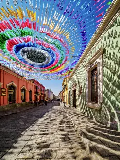 Hanging Prints: Colourful decorations at the Macedonio Alcala Street