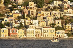 Images Dated 20th September 2021: Colourful Houses along Gialos Harbour, Symi Island, Dodecanese Islands, Greece