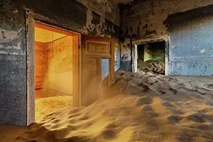 Luderitz Prints: Colourful painted rooms filling with sand in abandoned diamond mining town