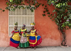 Images Dated 13th June 2018: Colourful Palenqueras selling fruits on the street of Cartagena, Bolivar Department