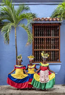 Colourful Palenqueras selling fruits on the street of Cartagena, Bolivar Department