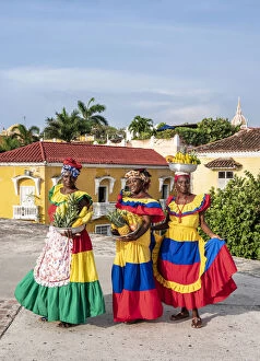 African American Gallery: Colourful Palenqueras selling fruits on the walls of Cartagena, Bolivar Department
