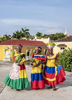Elegance Prints: Colourful Palenqueras selling fruits on the walls of Cartagena, Bolivar Department