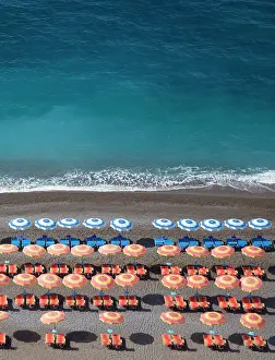 Positano Prints: Colourful sunbeds and parasols on the beach