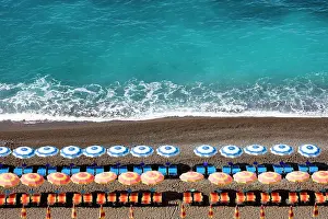Positano Prints: Colourful sunbeds and parasols on the beach