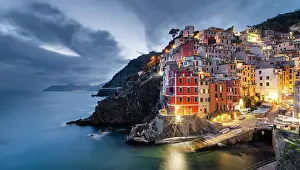 Cinque Terre Prints: The colourful village of Riomaggiore at dusk