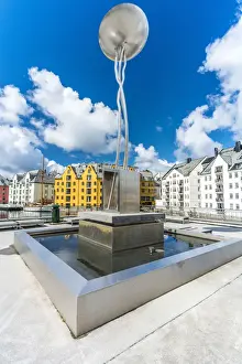 Iron Prints: Contemporary art metal sculture and fountain in the city centre of Alesund