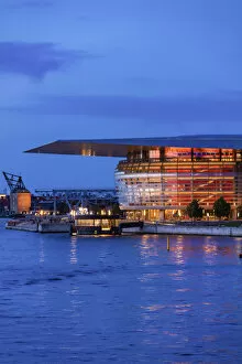 Images Dated 25th November 2019: Copenhagen Opera House reflecting in the canal by night, Denmark