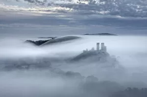Shadow Gallery: Corfe Castle in the mist, Dorset, England