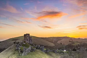 Corfe Castle at sunrise, Corfe, Dorset, England, UK
