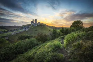 Corfe Castle at sunset, Isle of Purbeck, Dorset, England, UK
