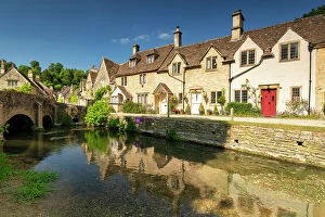 Images Dated 5th July 2023: Cottages Reflecting in By Brook, Castle Combe, Wiltshire, England