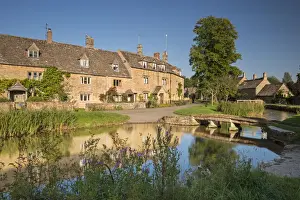 Gloucestershire Prints: Cottages beside the River Eye in the picturesque Cotswold village of Lower Slaughter