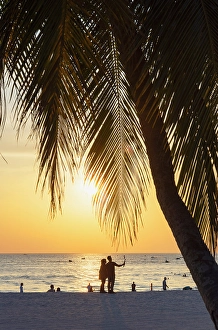 2 People Prints: Couple on Cenang Beach at sunset, Langkawi, Kedah, Malaysia