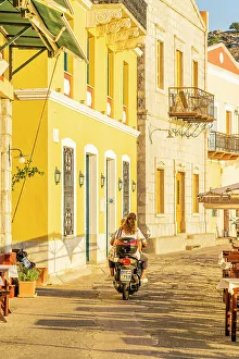 Scooter Prints: A couple riding a scooter in Symi, Dodecanese Islands, Greece