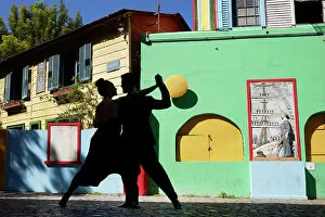 Images Dated 9th December 2022: A couple of Tango dancers in the 'Caminito de La Boca', Buenos Aires, Argentina. (MR)