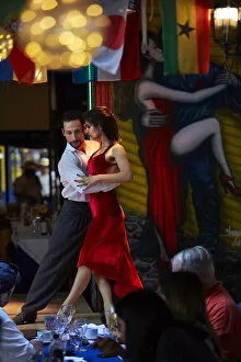 Dancers Collection: A couple of tango dancers perform a live-show in a restaurant of La Boca, Buenos Aires