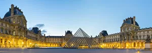 Courtyard and glass pyramid of the Louvre Museum at sunrise, Paris, Ile-de-France