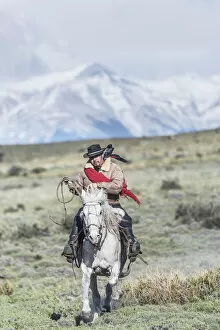 Andes Collection: Cowboy on horseback, Torres del Paine National Park, Chile, MR