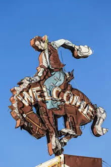 Images Dated 14th October 2013: Cowboy welcome sign, Jackson Hole, Wyoming, USA