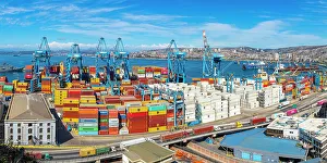 Cranes and cargo containers stacked at Port of Valparaiso, Caleta Portales, Valparaiso, Valparaiso Province, Valparaiso Region, Chile