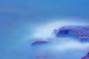 Central Canada Prints: Crashing waves over shorline rocks at dusk Killarney Provincial Park, Ontario, Canada