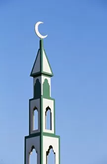 Oman Collection: The Crescent and short spire on top of a small wooden