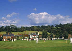 <b class=qtipBold><figcaption>Cricket on Village Green</figcaption></b><br>Cricket on Village Green, Surrey, England<br><em>© Jon Arnold Images Ltd</em> Cricket on Village Green