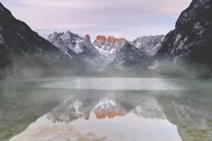 Cristallo Prints: Cristallo and Popena group reflecting in lake Landro during a misty sunset, Dolomites