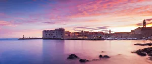 City Walls Prints: Croatia, Dubrovnik, Boats in the old town harbour at sunset
