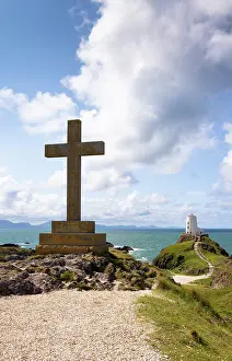 Anglesey Prints: A cross and Twr Mawr lighthouse on Llanddwyn Island in Anglesey, Wales