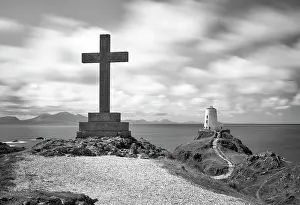 B And W Prints: A cross and Twr Mawr lighthouse on Llanddwyn Island in Anglesey, Wales