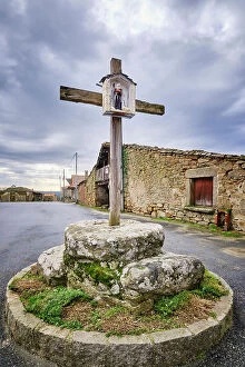 Religious Site Collection: A crossroad at Vila Cha da Braciosa. Traditional houses. Tras-os-Montes, Portugal