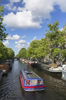 Amsterdam Prints: Cruise boat on Prinsengracht canal, Amsterdam, Netherlands