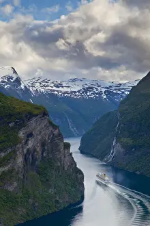 Nautical Theme Prints: A Cruise Ship navigates through a bend in the dramatic Geiranger Fjord, Geiranger