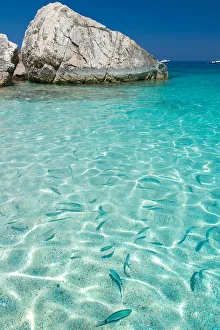 Transparent Prints: Crystalline water in Cala Mariolu beach, Baunei, Ogliastra province, Sardinia, Italy