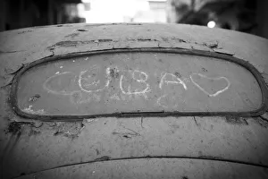 Dust Gallery: Cuba drawn in the dirt on a rear windscreen of old car, Habana Vieja