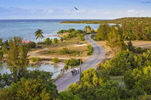 Images Dated 12th July 2016: Cuba, Holguin Province, Horse and cart on coastal road at Playa Guardalvaca