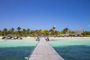 Images Dated 12th July 2016: Cuba, Jardines del Rey, Cayo Guillermo, Playa El Paso, Wooden pier leading to Melia Hotel