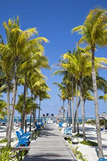 Images Dated 12th July 2016: Cuba, Jardines del Rey, Cayo Guillermo, Playa El Paso, Melia Hotel, Palm lined wooden